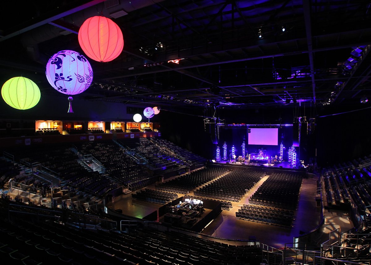 Interior shot of 1stBank Center with colored lanterns and no guests