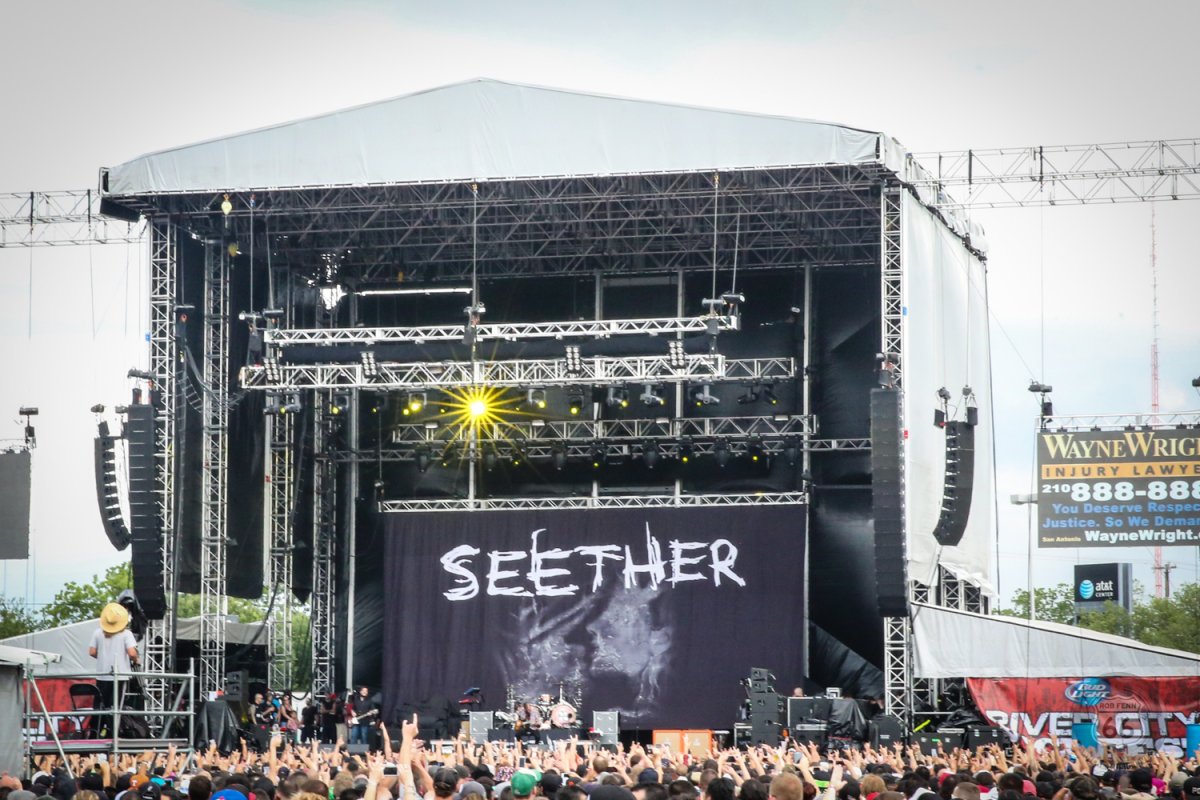 Image of Seether performing on stage at River City Rock Fest