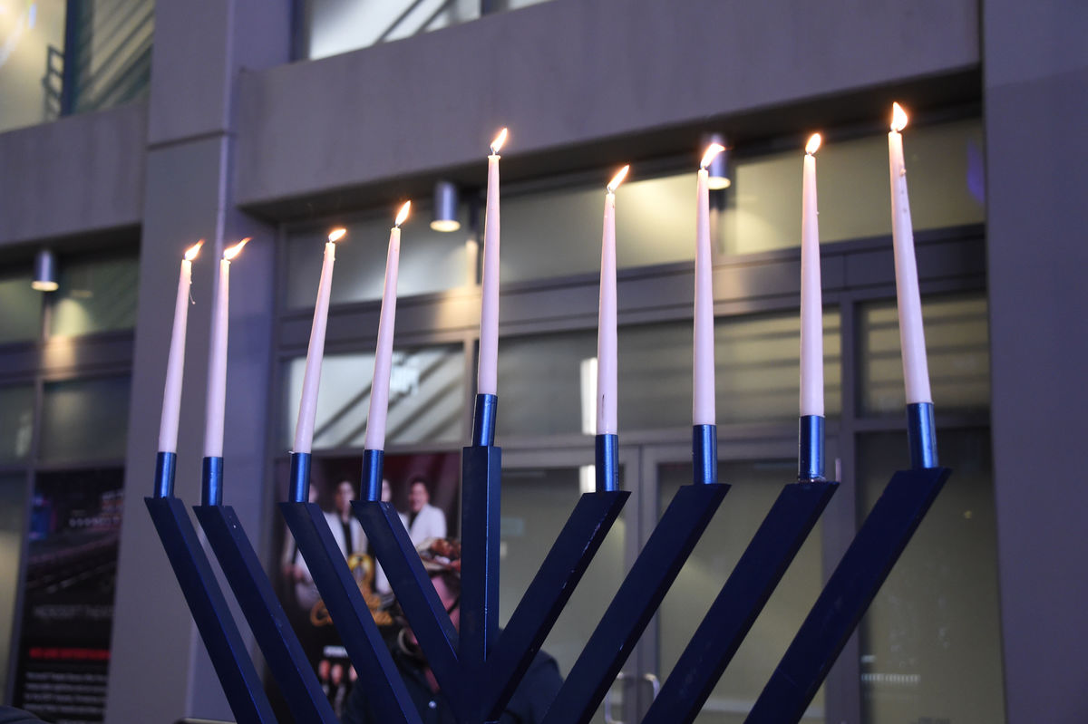 All eight candles are lit on a six-foot menorah in celebration of the eighth and final night of Chanukah at L.A. LIVE as part of AEG’s Season of Giving.
