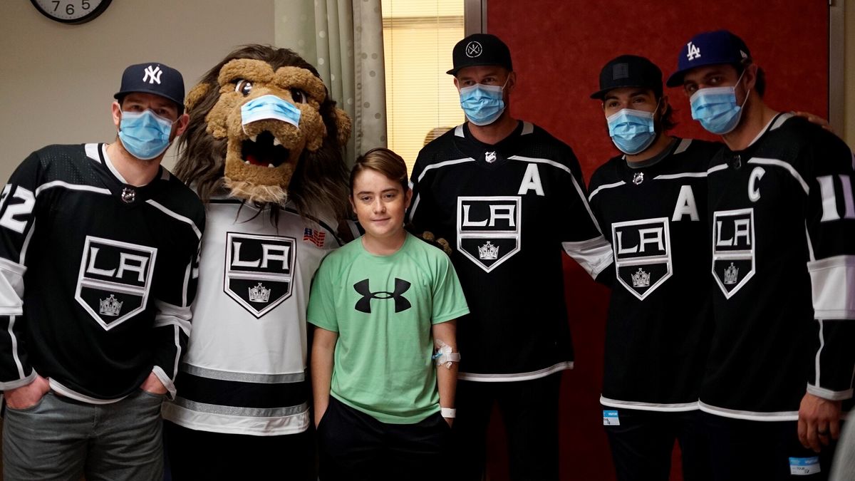 AEG’s LA Kings players (from left to right) Jonathan Quick, Jeff Carter, Drew Doughty and Anze Kopitar meet with a patient during the team’s annual team visit to Children’s Hospital Los Angeles on January 16, 2018.