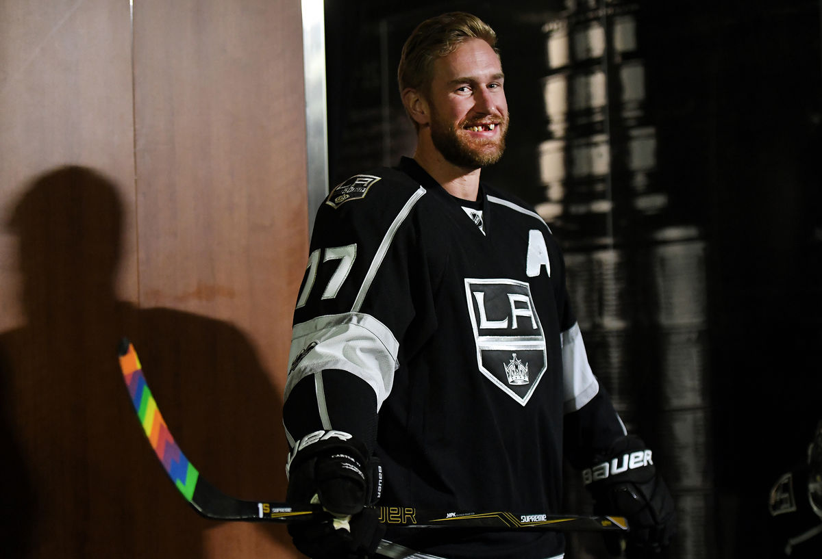 LA Kings all-star and assistant captain Jeff Carter heads to the ice before warm-ups with rainbow stick tape during LA Kings Pride Night.