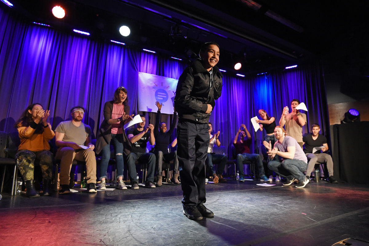 AEG teams up with Young Storytellers to mentor a group of students from Hollenbeck Middle School in Boyle Heights, Calif. in the Script-to-Stage program. Following the performance of his script by professional actors, George takes a bow on stage at the Clive Davis Theater in the GRAMMY Museum on March 21, 2018.