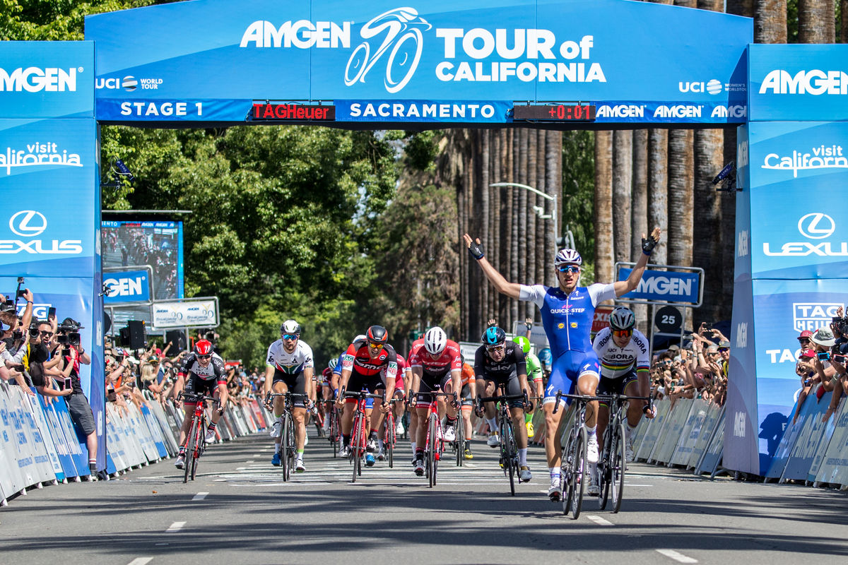 Racers cross the finish line for Stage 1 of Amgen Tour of California in Sacramento.