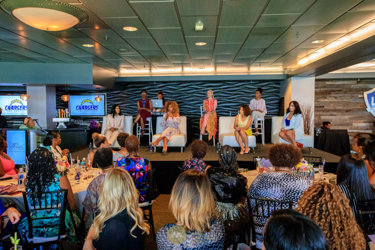 Panelists at the Fifth Annual Women in Entertainment Luncheon sit on a stage in front of guests to offer inspiring insight on facing adversity and the need for trailblazers in the entertainment industry at StubHub Center in Carson, Calif. on June 15, 2018.