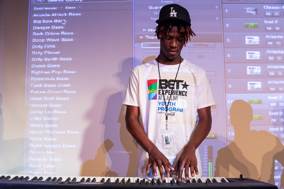 A student in the BET Experience Youth Program participates in a music production class where he learns to layer a beat at the GRAMMY Museum at L.A. LIVE. 