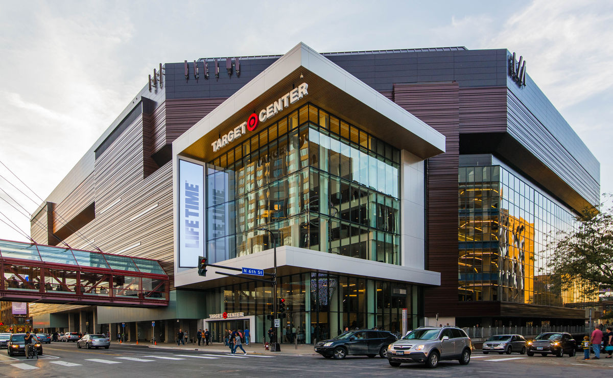 External shot of Target Center in Minneapolis with cars driving by. 