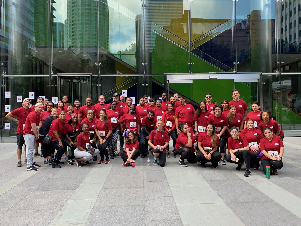 AEG employees gather for a group photo following the Fight for Air Climb event in downtown Los Angeles.