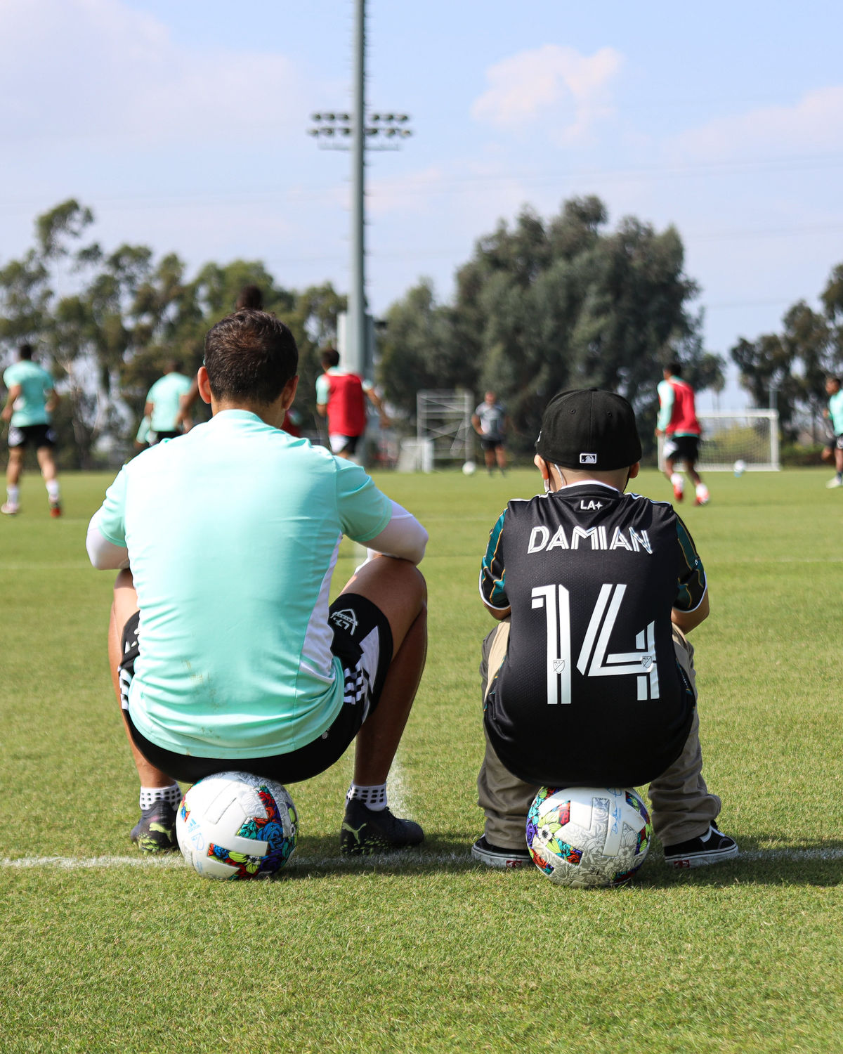 Javier 'Chicharito' Hernandez and Damian watch training at Dignity Health Sports Park.