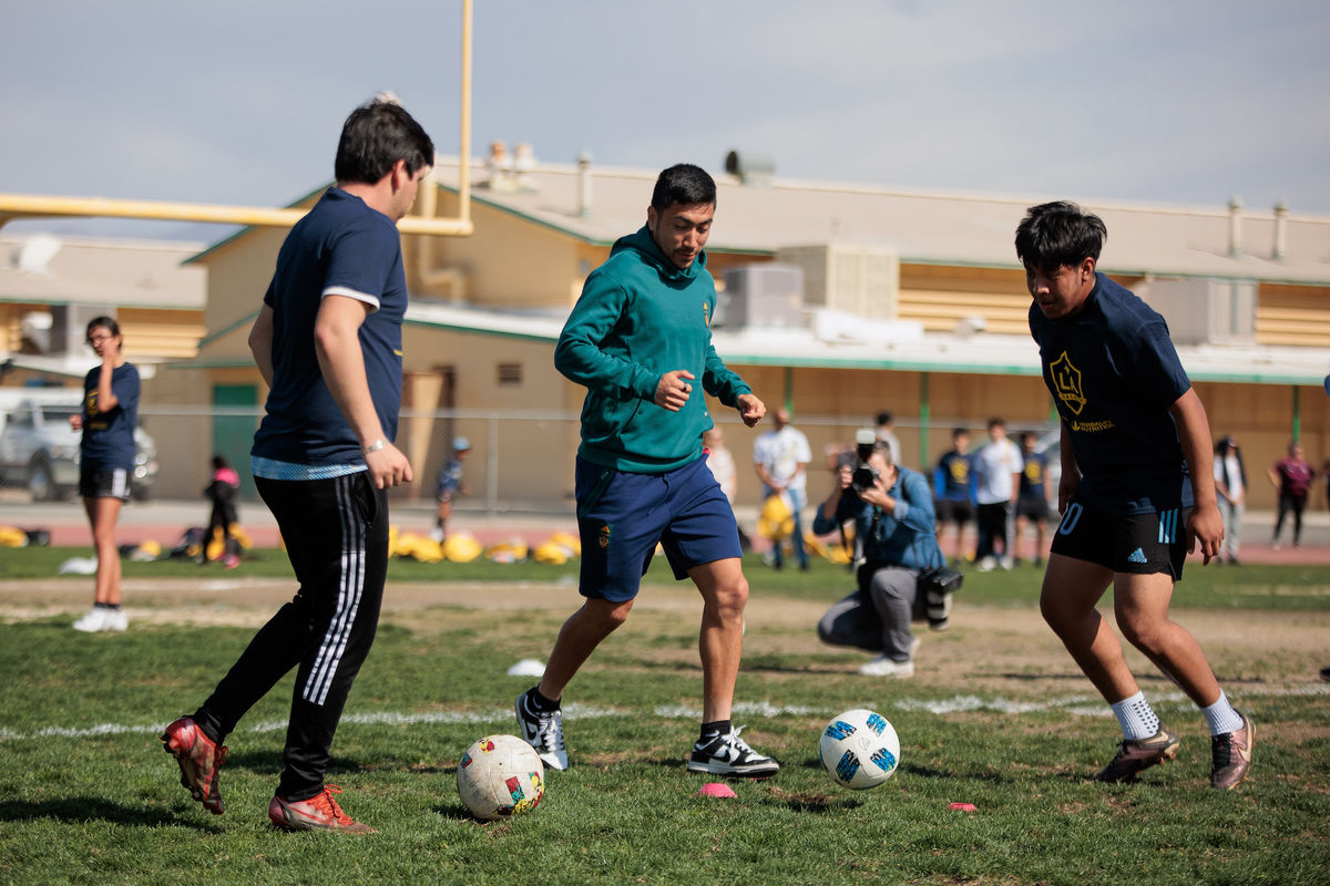LA Galaxy’s Jose “Memo” Rodriguez plays soccer with migrant student athletes from Coachella Valley.