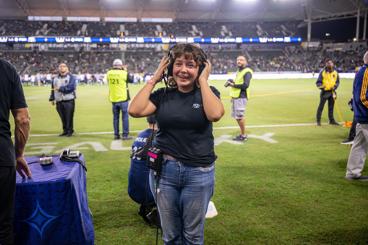 A student gets firsthand experience of game day operations at the LA Galaxy