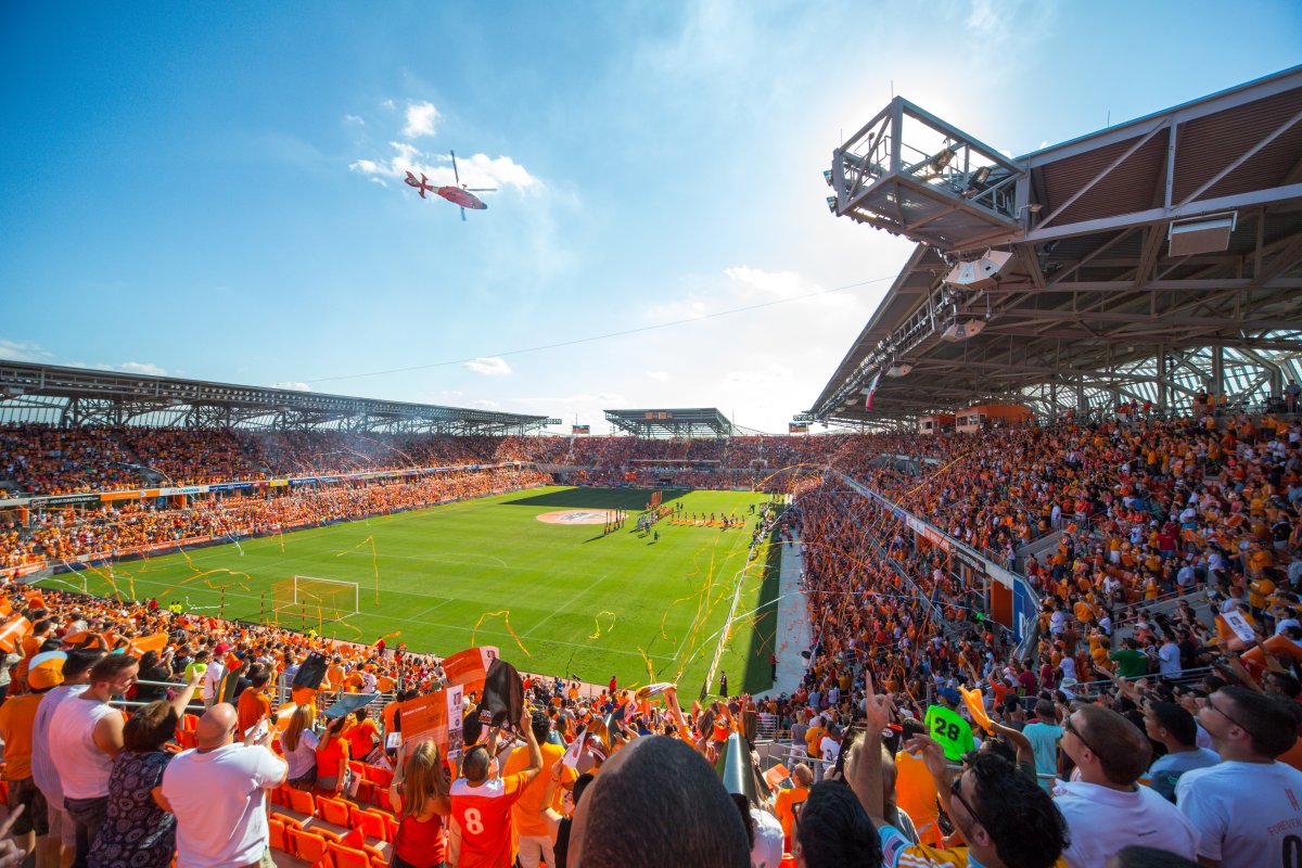 Interior image of BBVA Compass Stadium during a soccer game with the crowd cheering