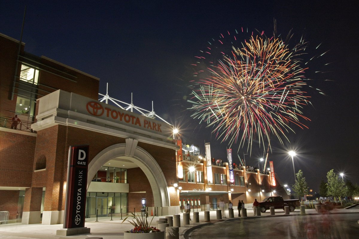Exterior image of Toyota Park at night with fireworks behind it