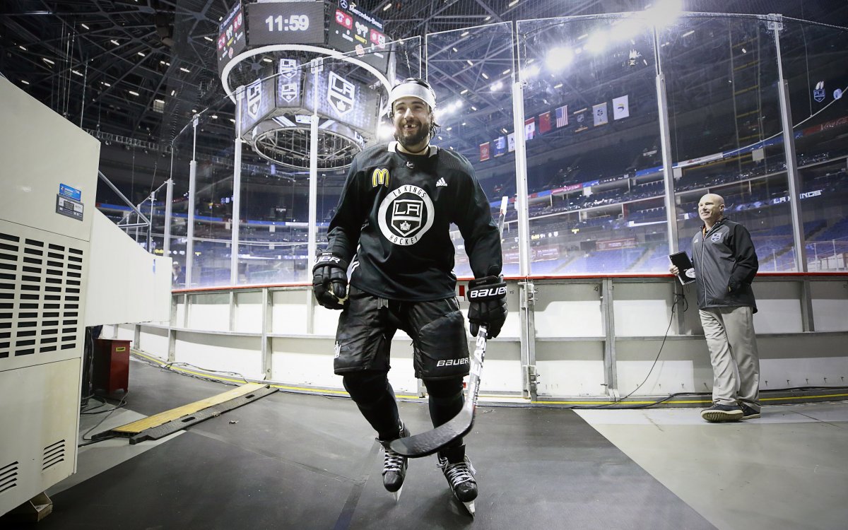 Image of Drew Doughty coming off the ice with a McDonalds logo on his jersey