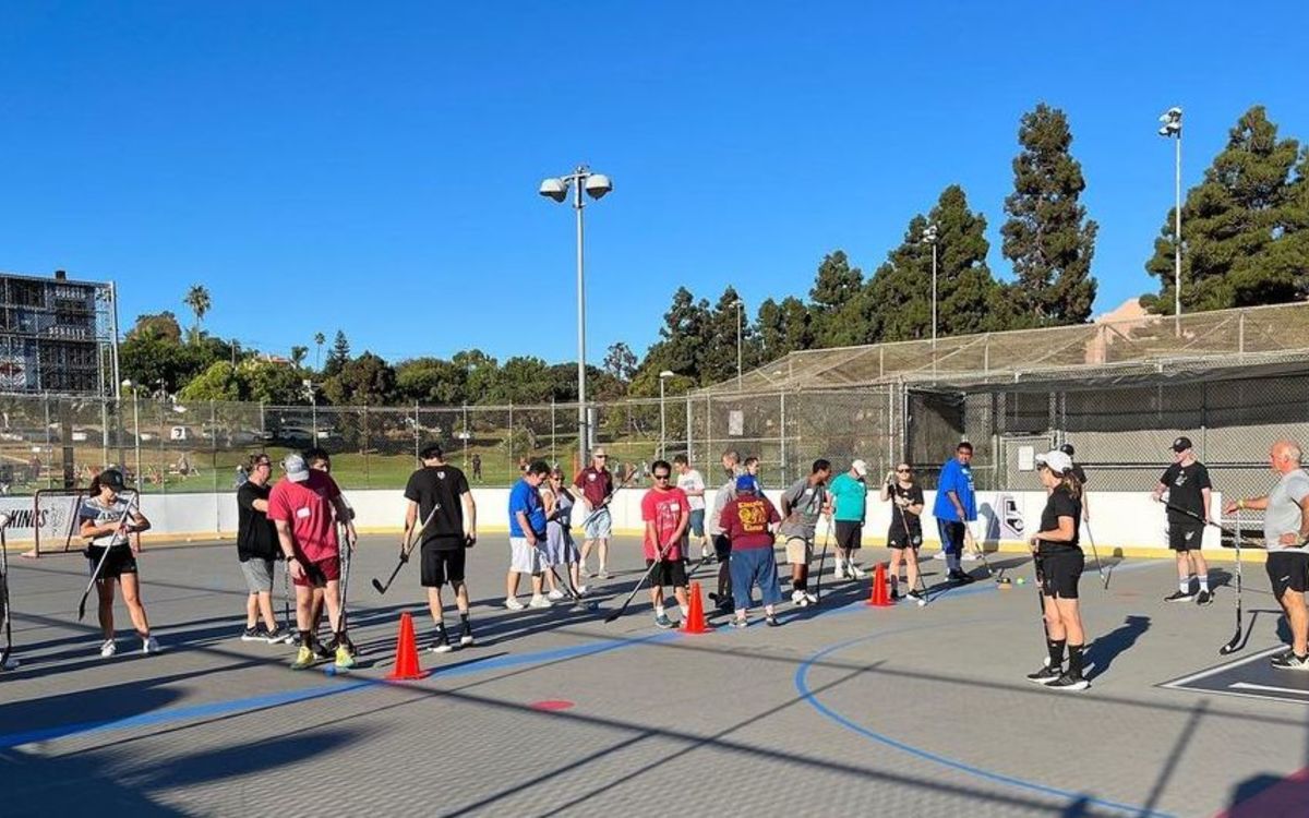 Special Olympics Southern California's floorball team participates in ball hockey drills led by the LA Kings Ice Crew.