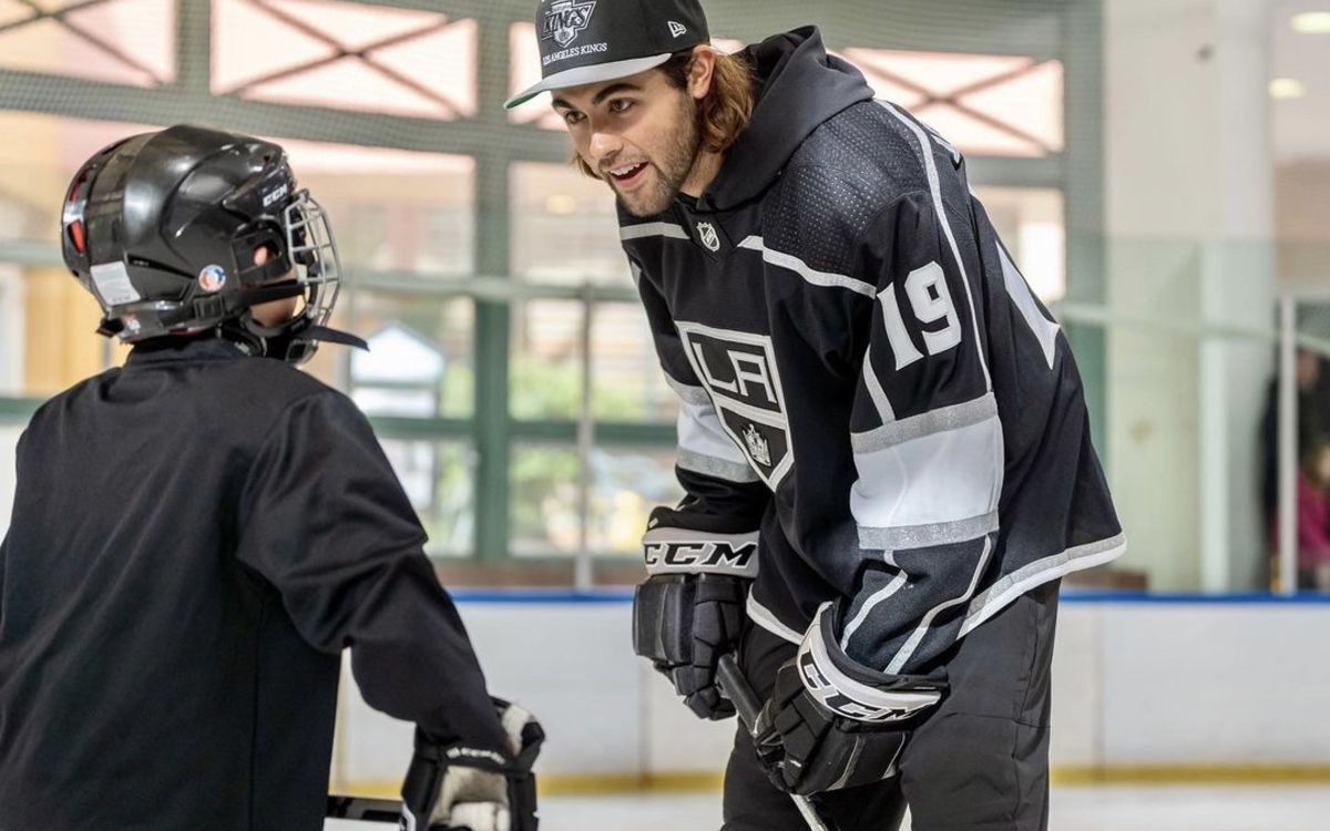 LA Kings Alex Iafallo talking with youth hockey player during We Are All Kings Rink Tour practice.