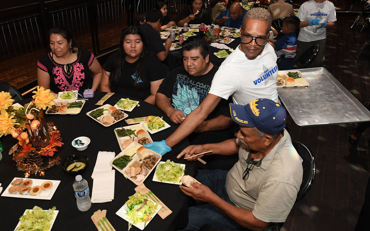 AEG employees served 500 Thanksgiving meals, prepared by Wolfgang Puck Catering, to local families in need at the 11th annual Community Thanksgiving celebration at the Novo LA LIVE in Los Angeles, CA.