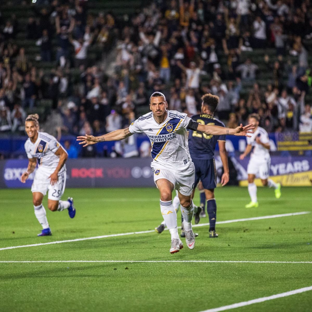 Galaxy soccer player celebrating on the field
